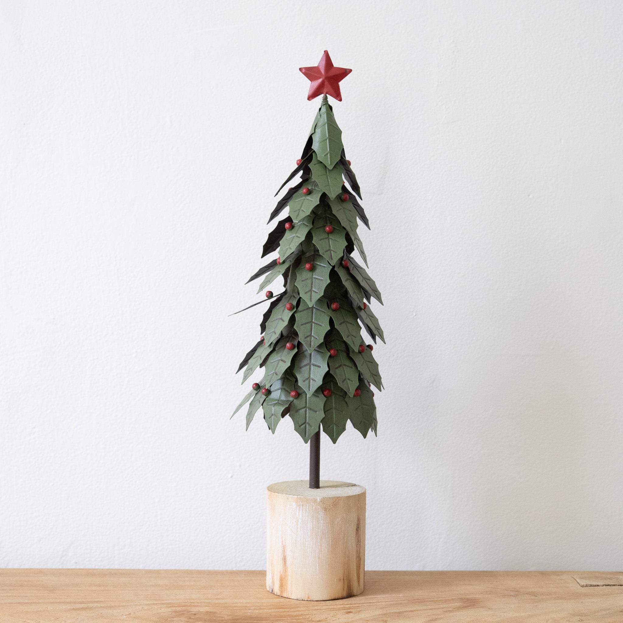 Holly Tree on Log Base