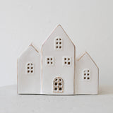 Trio of Lit White Ceramic Houses
