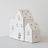 Trio of Lit White Ceramic Houses