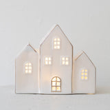 Trio of Lit White Ceramic Houses