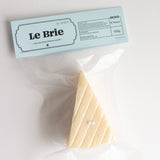 Packaged cheese with 'Le Brie' label on a white background