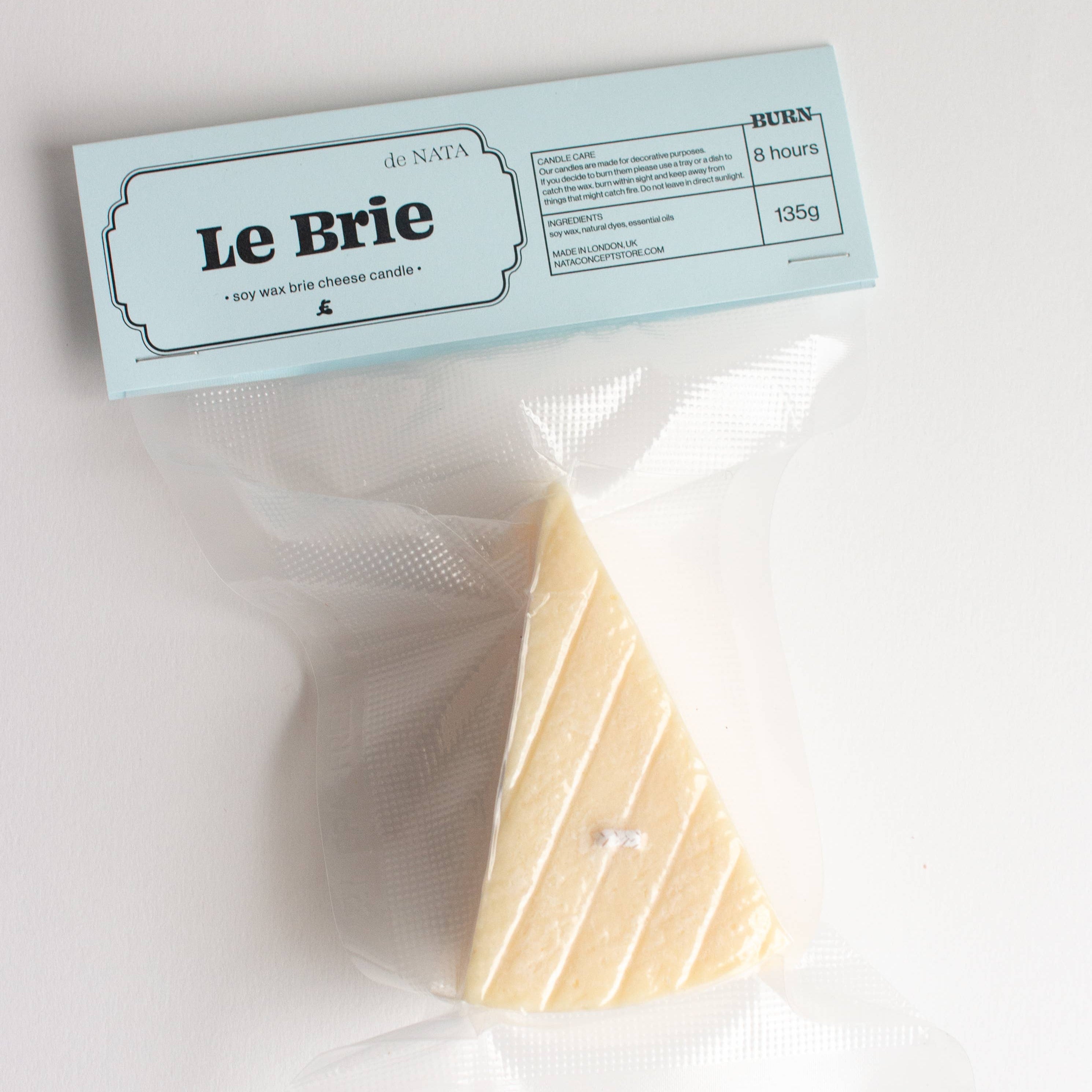 Packaged cheese with 'Le Brie' label on a white background