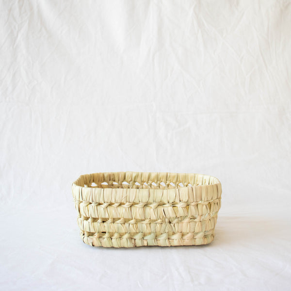 small open weave handwoven straw rectangular storage basket