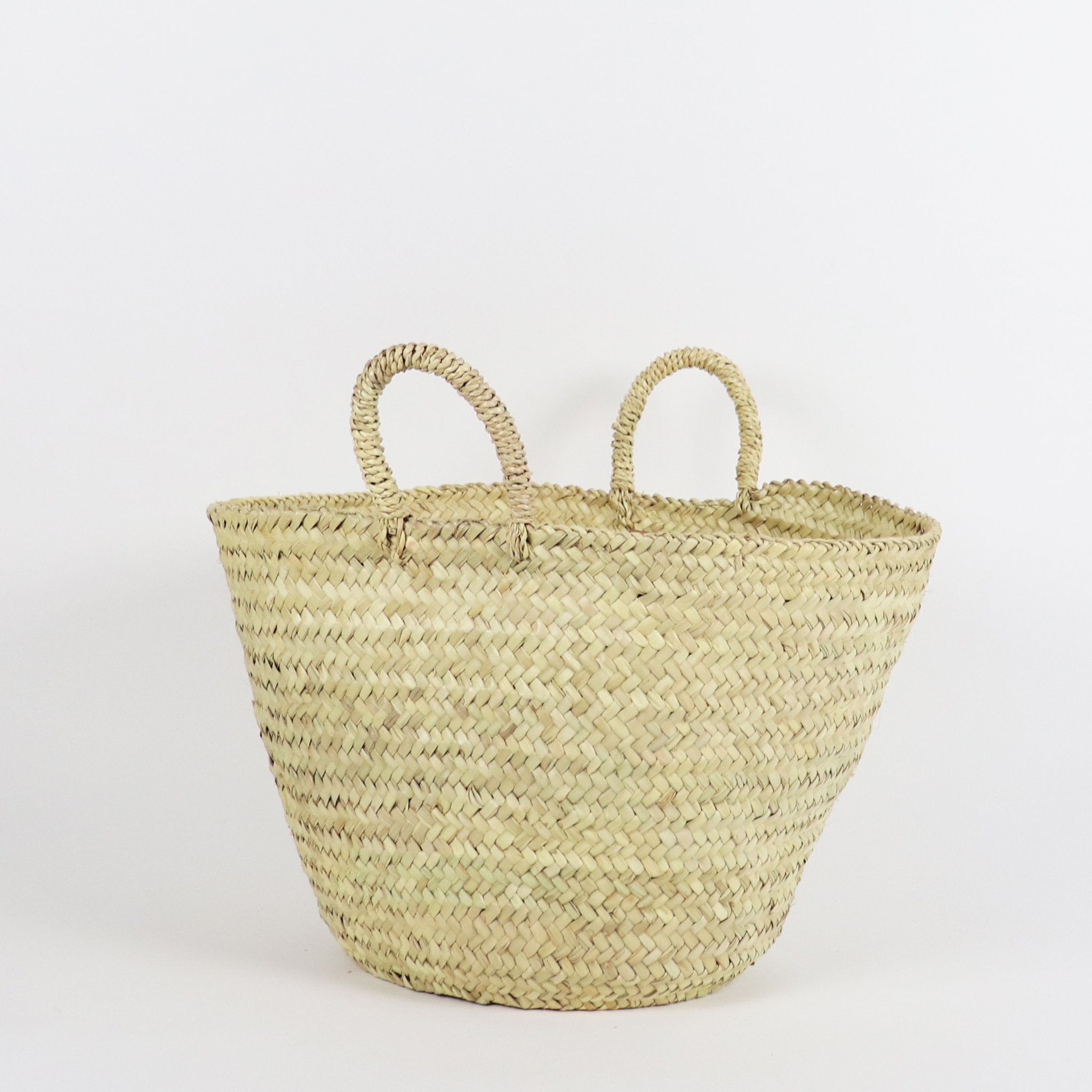 wide mouth tapered handwoven straw basket with straps