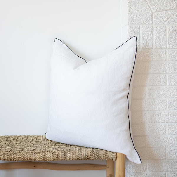 white square linen pillow with black edges