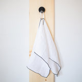 white linen tea towels with black edge