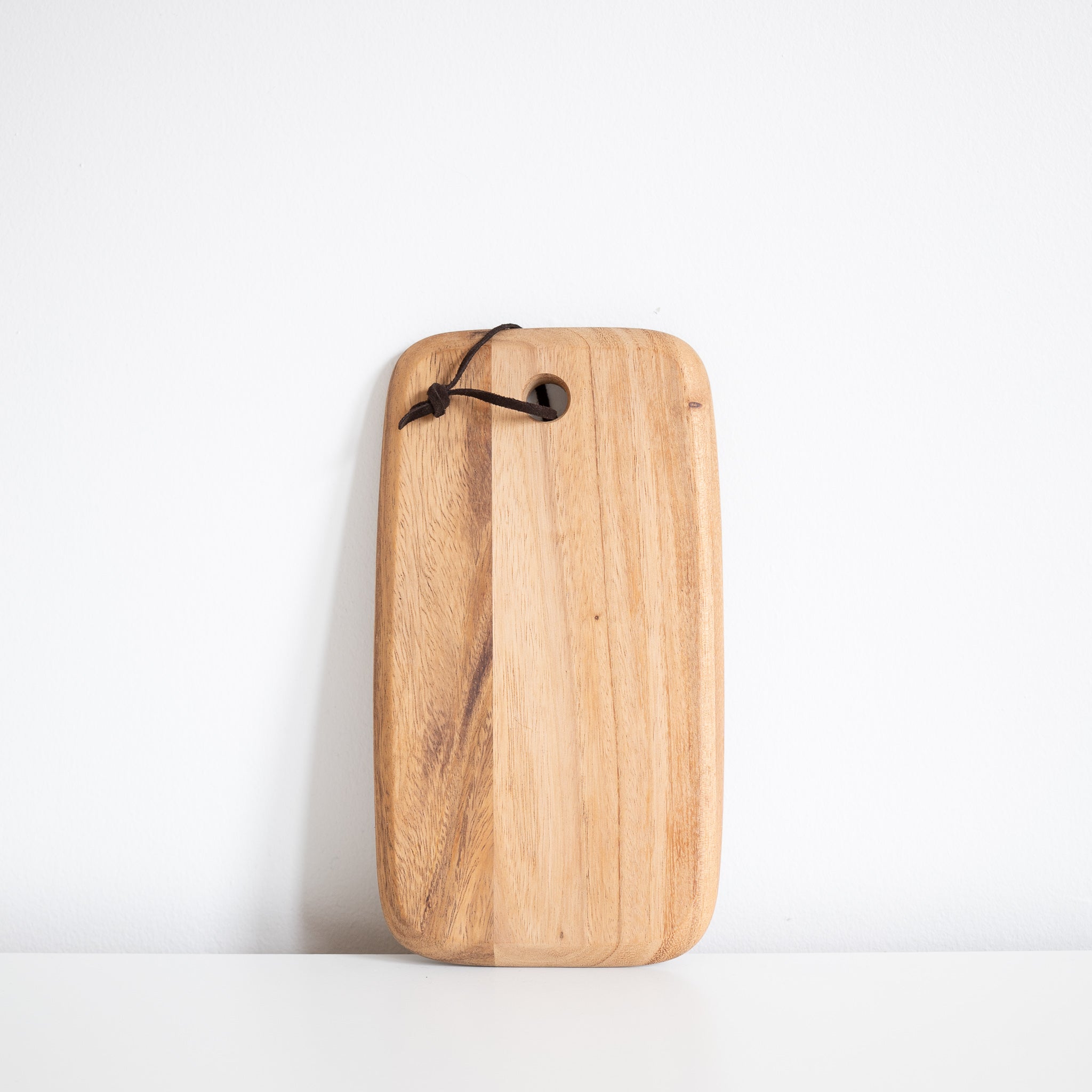 small rectangular acacia wood cheese board with leather strap