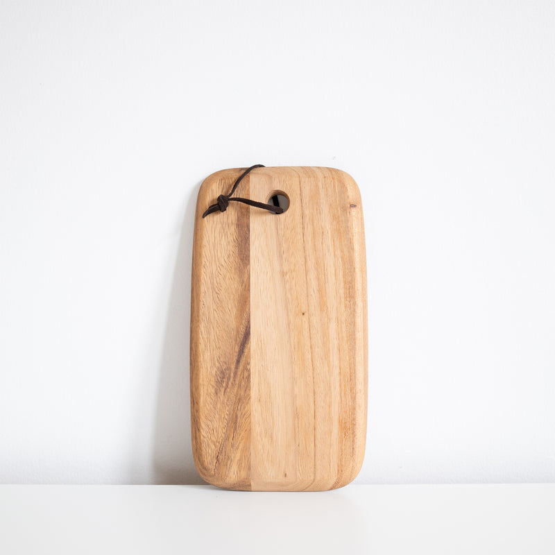 small rectangular acacia wood cheese board with leather strap