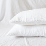 white linen pair of pillowcases 