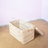 large open weave hand woven straw trunk with closing lid and handles