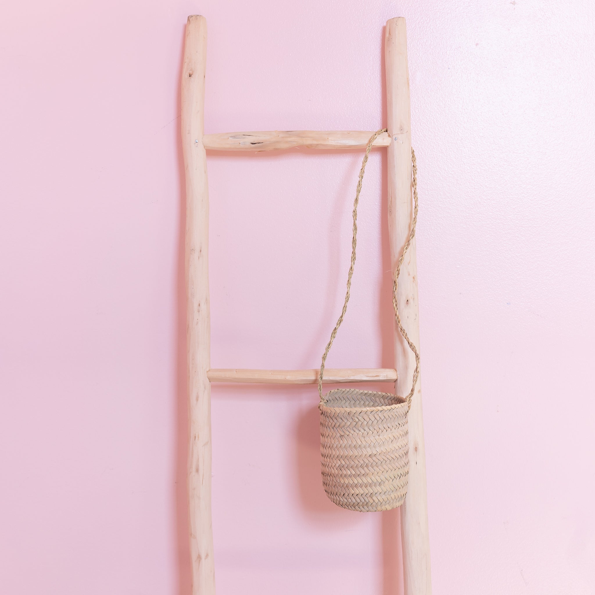 handwoven straw hanging planter