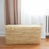 large open weave hand woven straw trunk with closing lid and handles