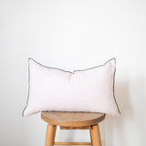 blush linen lumbar pillow with black edge