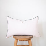 blush linen lumbar pillow with black edge