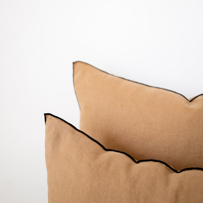 camel square linen pillow with black edges