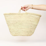 handwoven straw market basket with straps