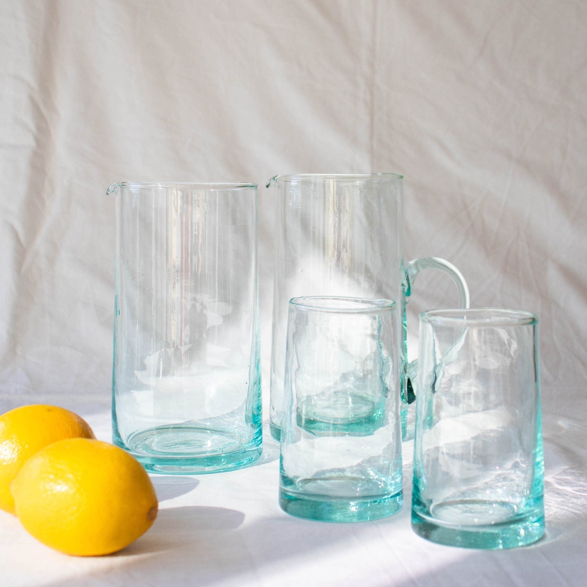 clear recycled glass jug with spout with matching tumblers