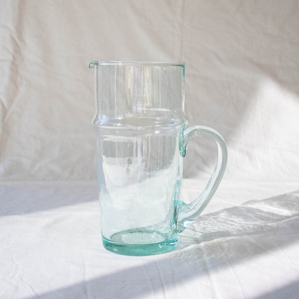 clear recycled glass beldi shaped jug with spout and handle