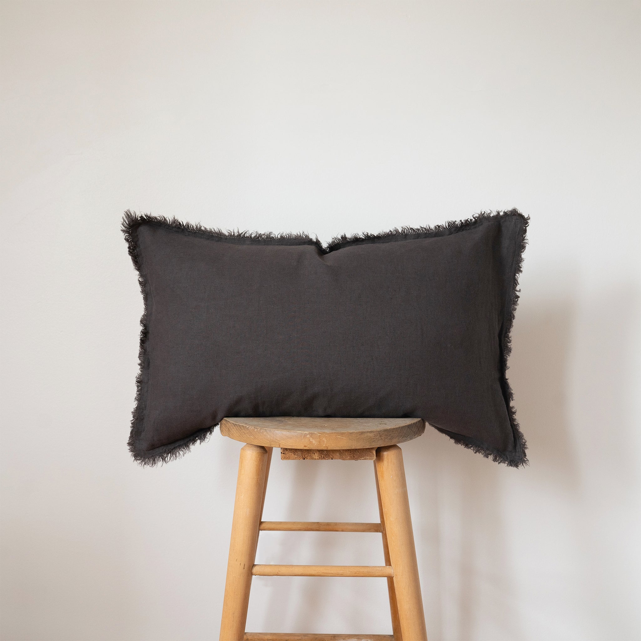 charcoal fringed lumbar linen pillow