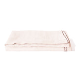 Blush linen tablecloth with black edge