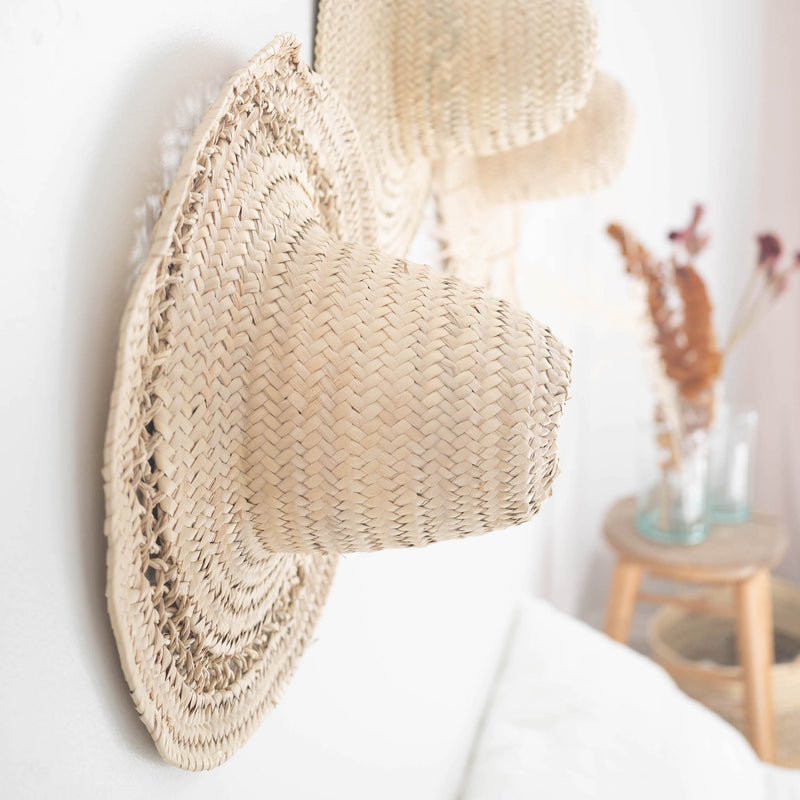 decorative handwoven straw hat with open weave