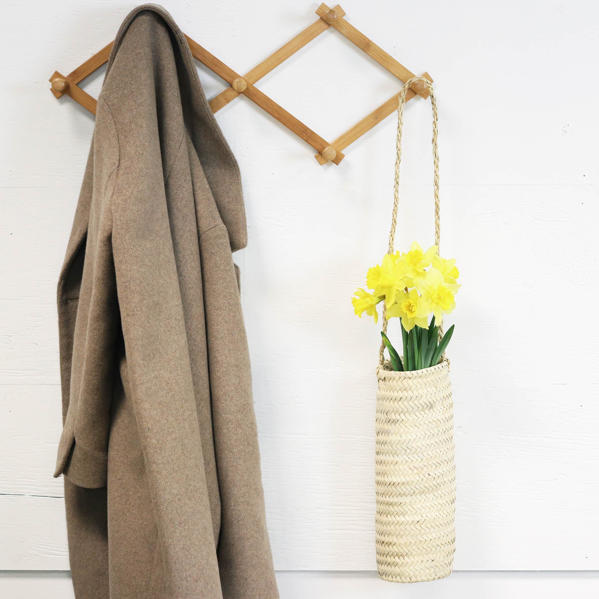 handwoven straw hanging planter with strap
