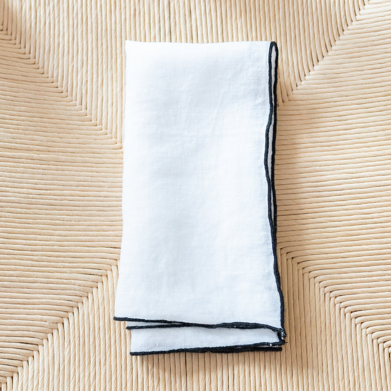white black edged linen placemat