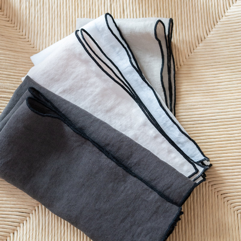 black, charcoal, and natural black edged linen placemat