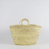 medium handwoven straw market basket with straps